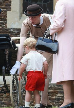 Nanny Maria Borrallo in her Norland nanny uniform with Prince George2.jpg